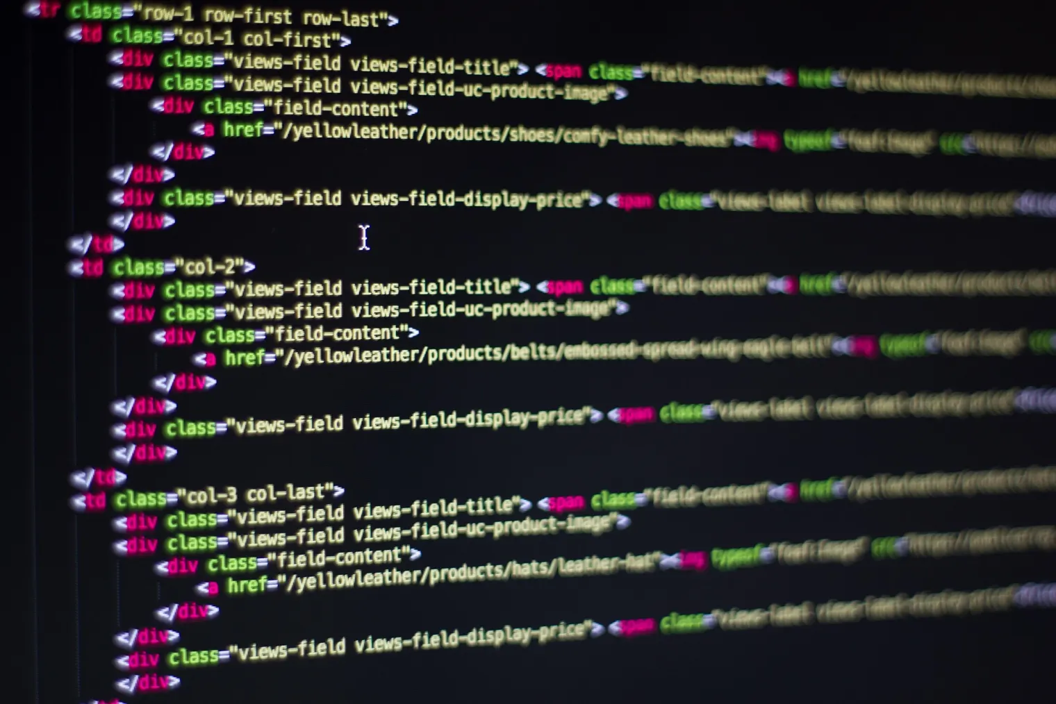 Lines of HTML code on a screen, representing the work of Soultec's software factory